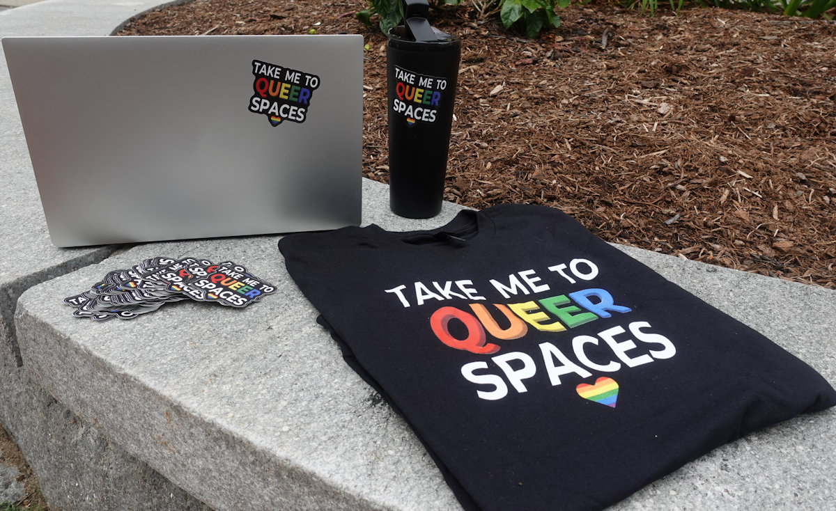 Queer Spaces merchandise on display